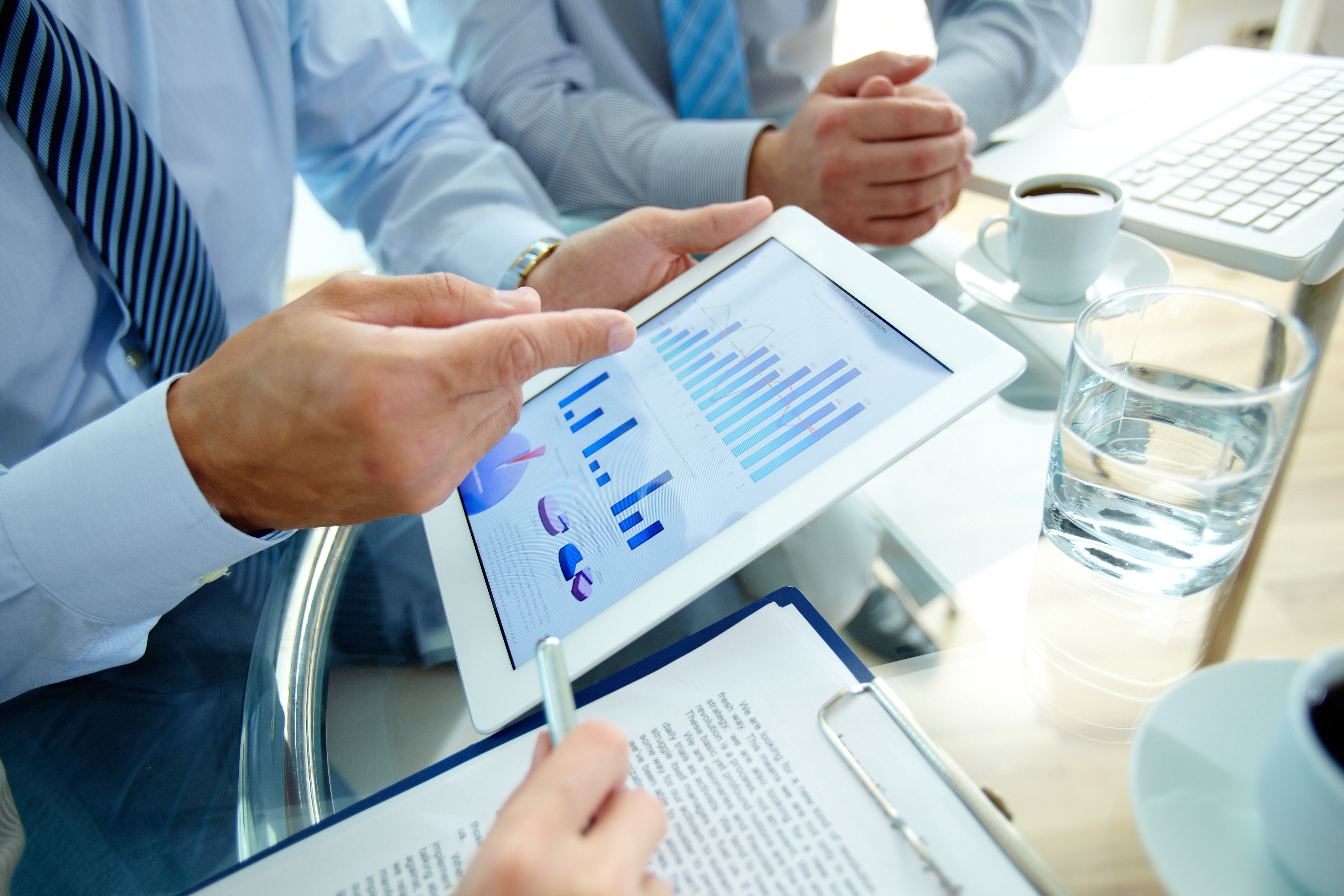close-up-executive-pointing-graph